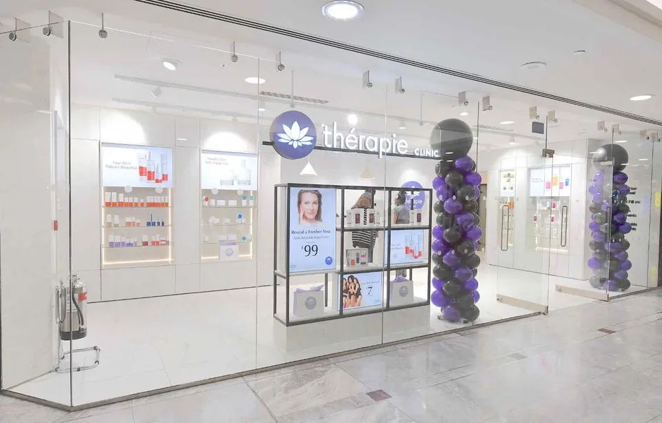 Thérapie Clinic Canary Wharf Cabot Place shopfront and glass entrance