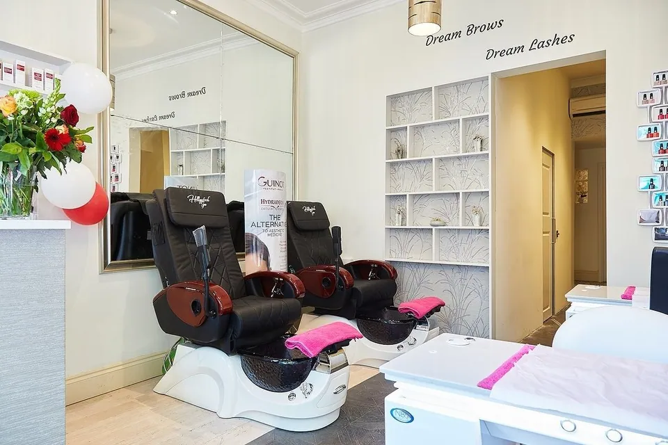 Pedicure chairs and nail treatment area at Chiswick Beautique.