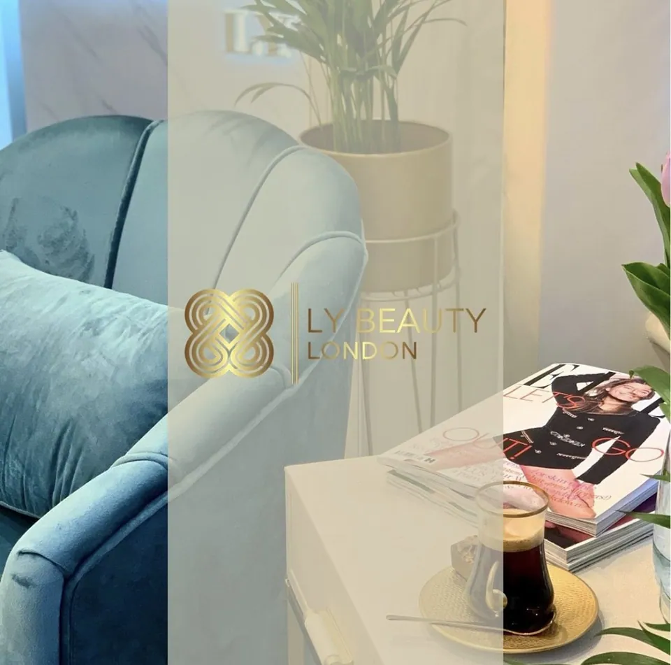 Blue seating and a manicure table in an official L.Y. Beauty London salon photograph.