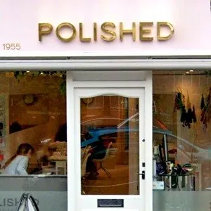 Polished salon shopfront on North Cross Road, East Dulwich.