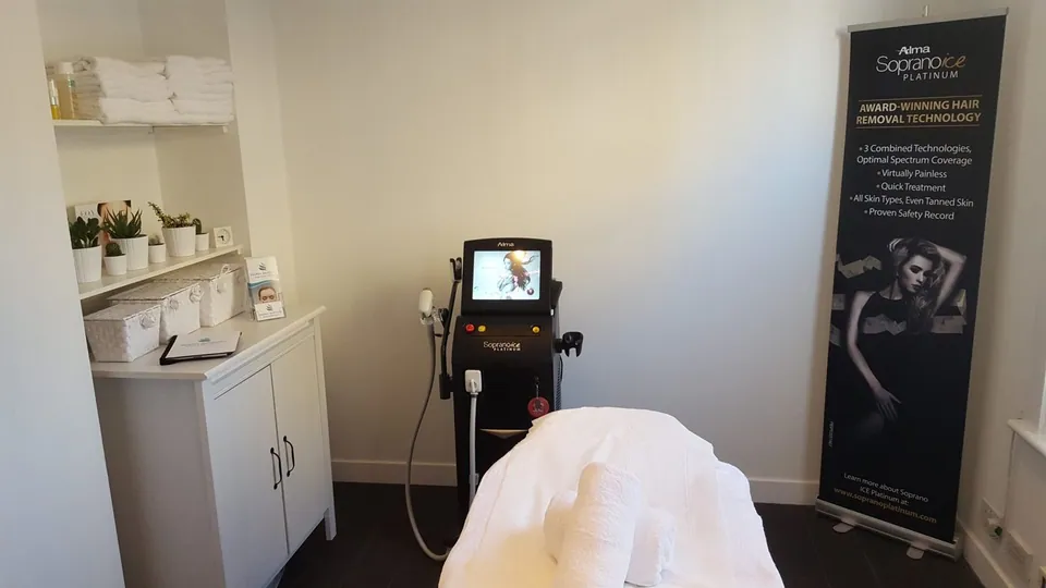 Treatment room at Mayfair Aesthetics Angel with a treatment couch and laser equipment
