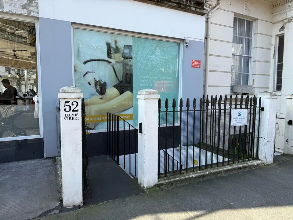 Mayfair Aesthetics Pimlico exterior with the 52 Lupus Street sign and stairway