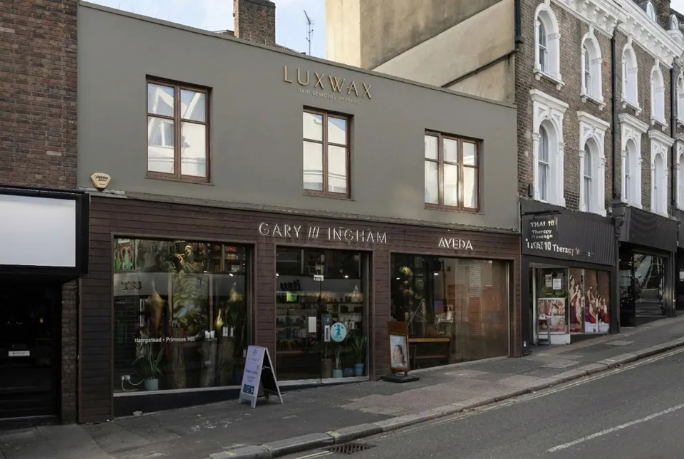 Exterior of Gary Ingham Salon on Heath Street with LuxWax lettering above.
