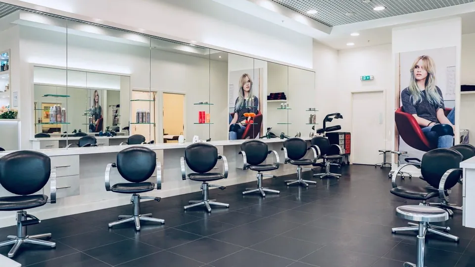 Styling chairs and large mirrors in the Vida Hair & Beauty Ilford branch.