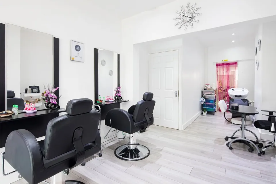 Styling chairs and mirrors inside The Beauty Bar Wembley