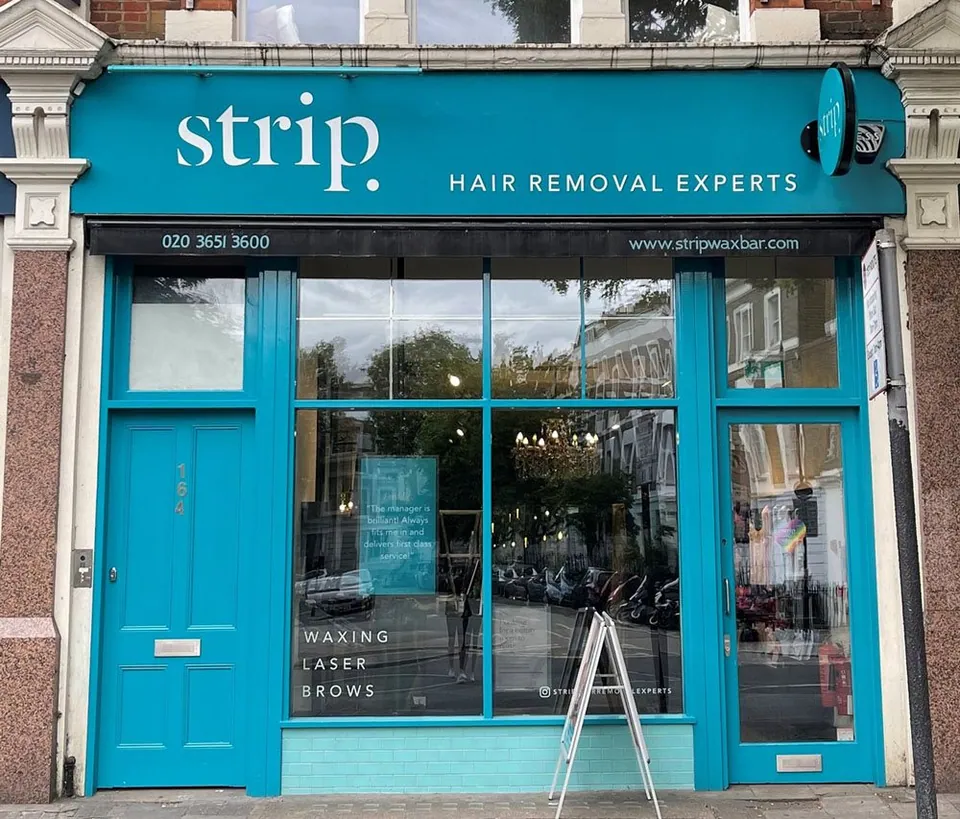 Strip Islington shopfront at 164 Upper Street