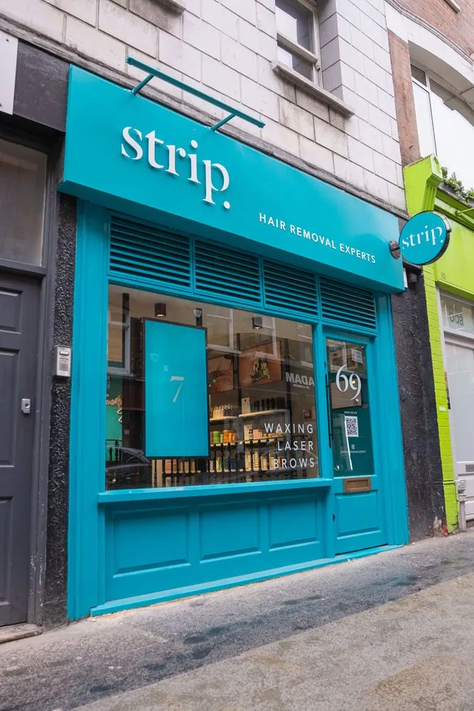 Strip Soho shopfront at 69 Berwick Street